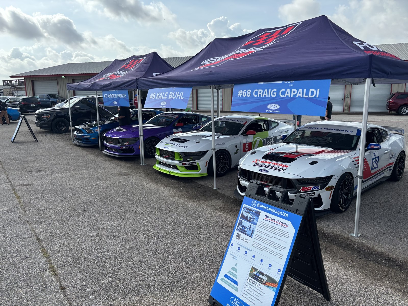 Capaldi Racing paddock setup with Mustang Cup and Mustang Challenge cars